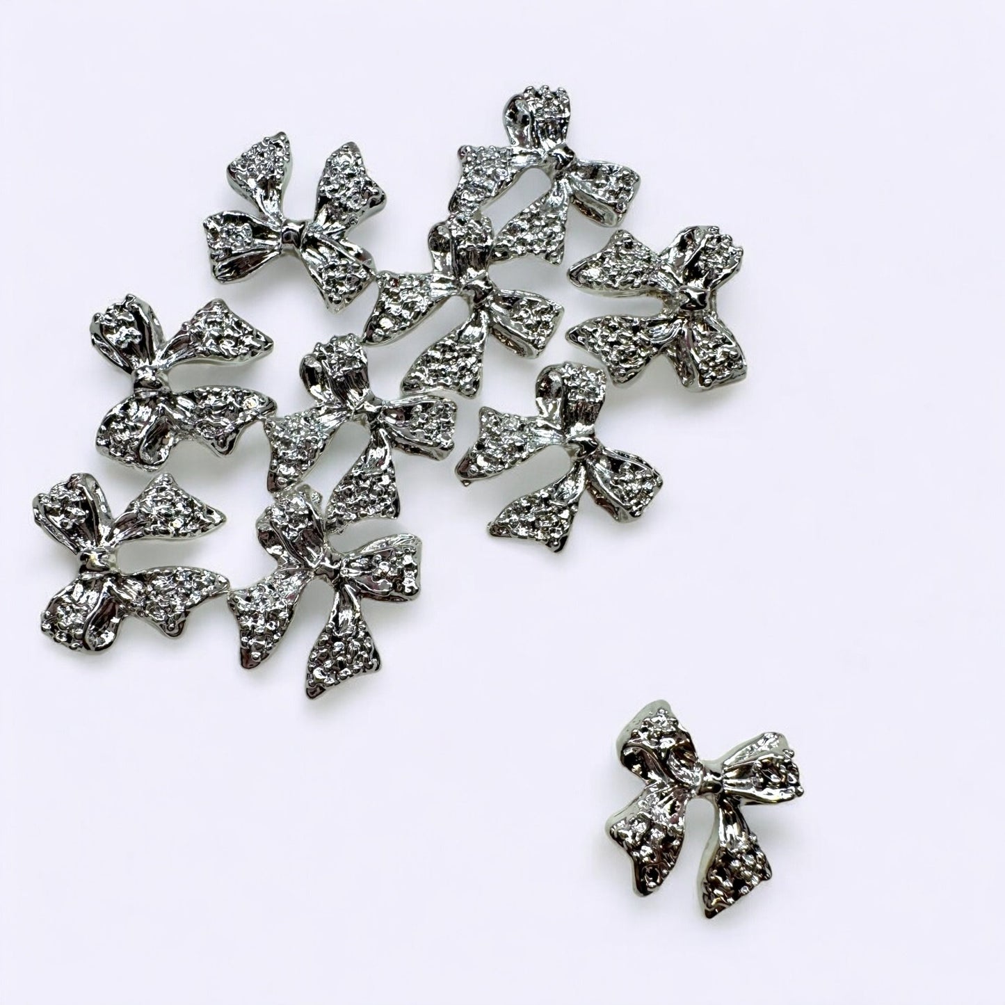10 - Piece Silver Bow Nail Charms - Model 01 Elegant 3D Nail Art Decorations - JTessentials