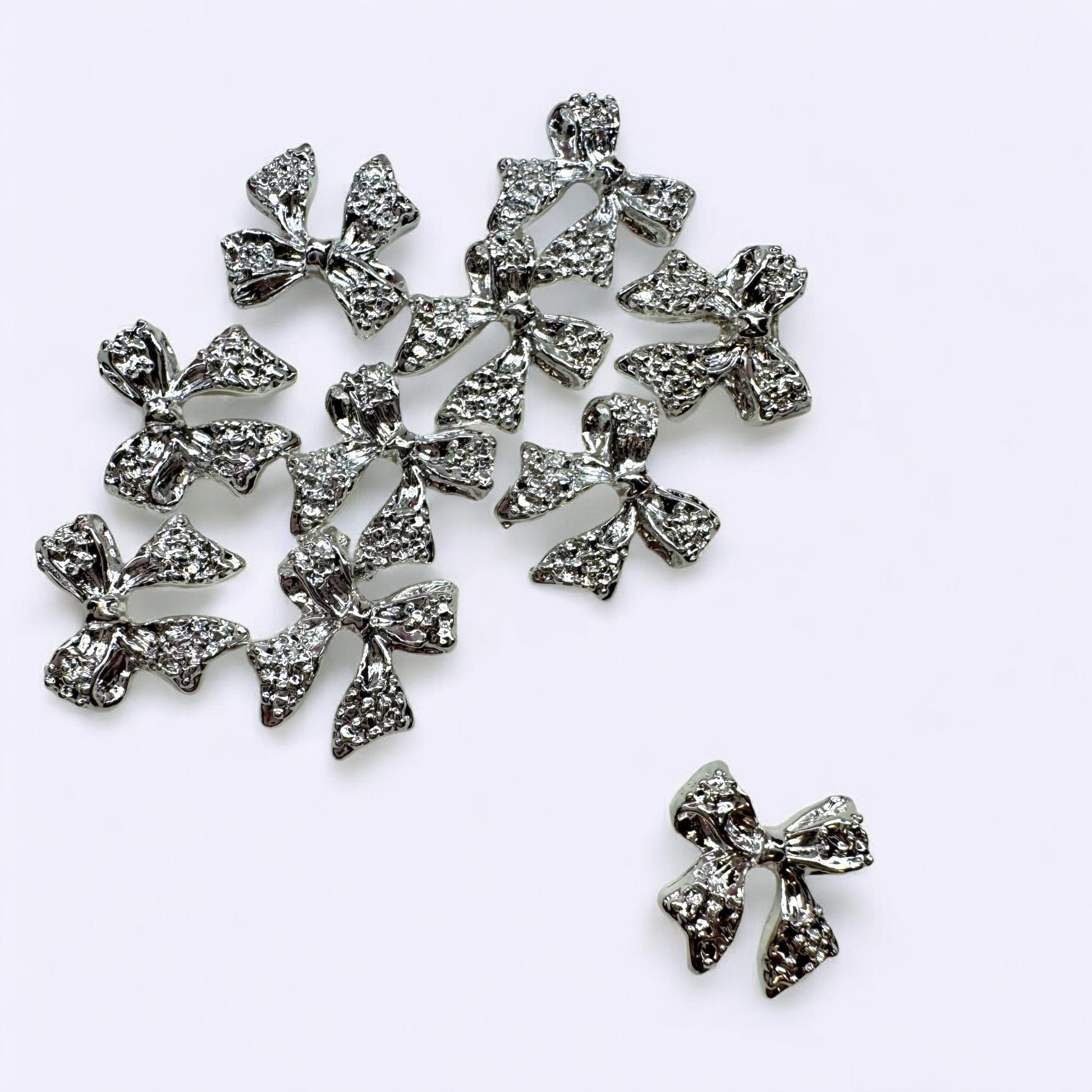 10 - Piece Silver Bow Nail Charms - Model 01 Elegant 3D Nail Art Decorations - JTessentials