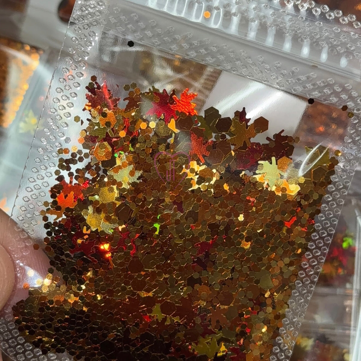 Autumn nail decoration- fall colors leaves and glitter mix