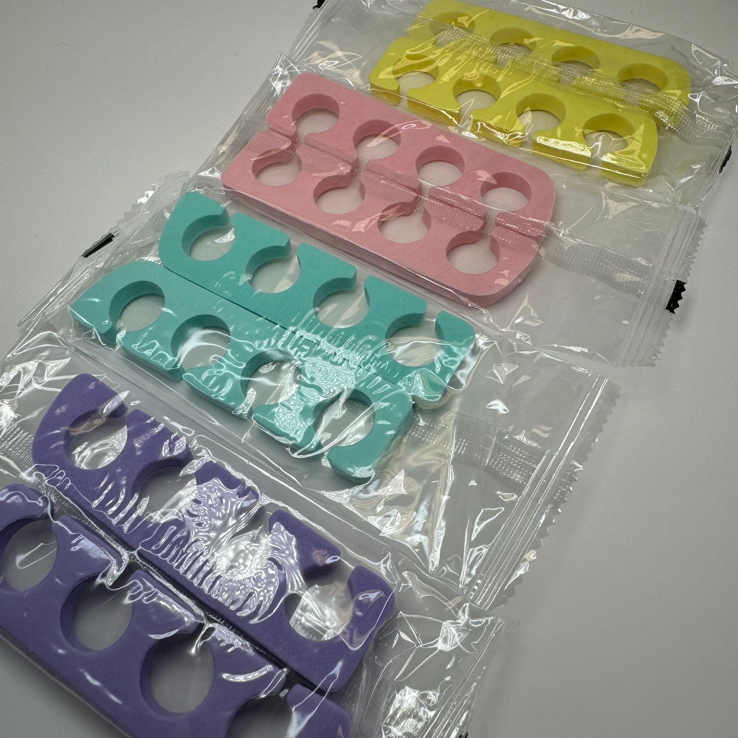 4 packs  -TOE separator (2pc) ea